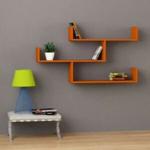 “Set of three black MDF wooden wall shelves for modern Indian living room décor”
